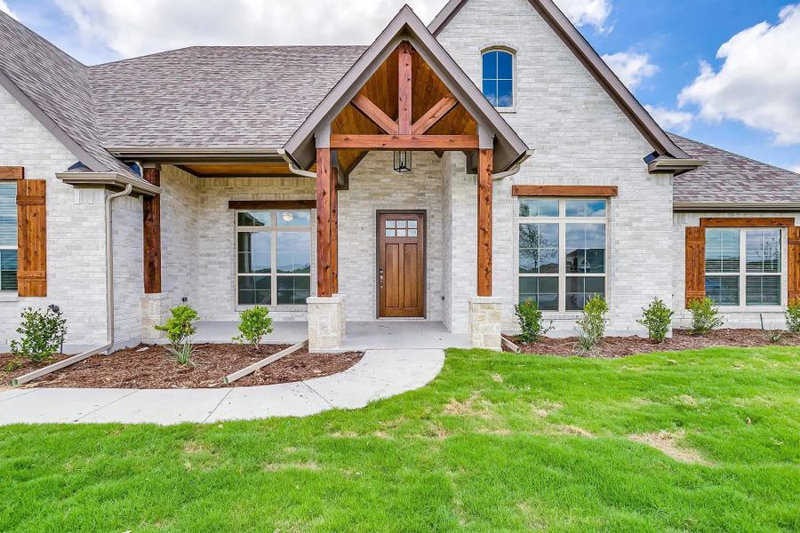 Representative exterior photo of a completed home built from the The Nathan by Elmwood Custom Homes in Ranch at Stone Hill, Waxahachie, TX (Image 4).