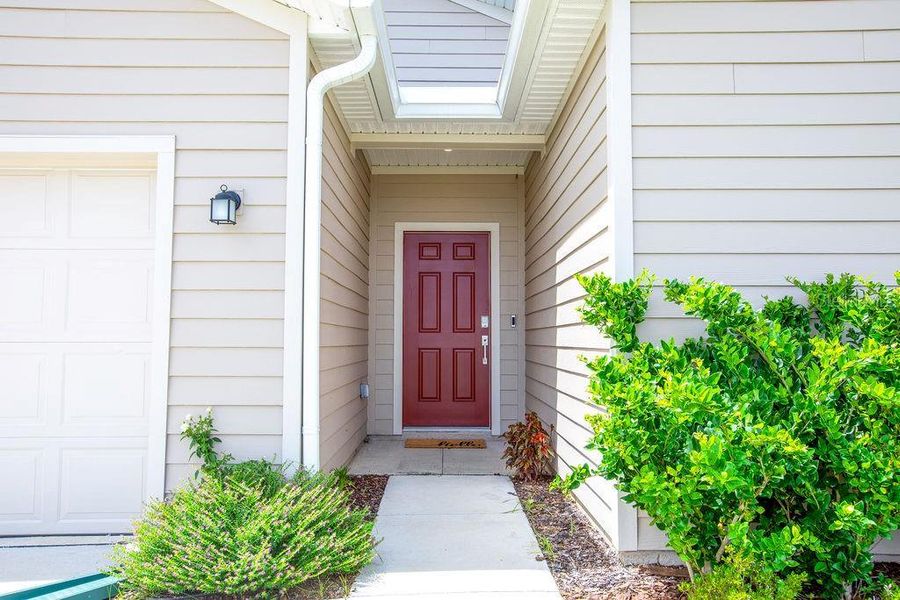 Exterior details and patio area of a home in Trailhead Landing, Alachua (Image 3).