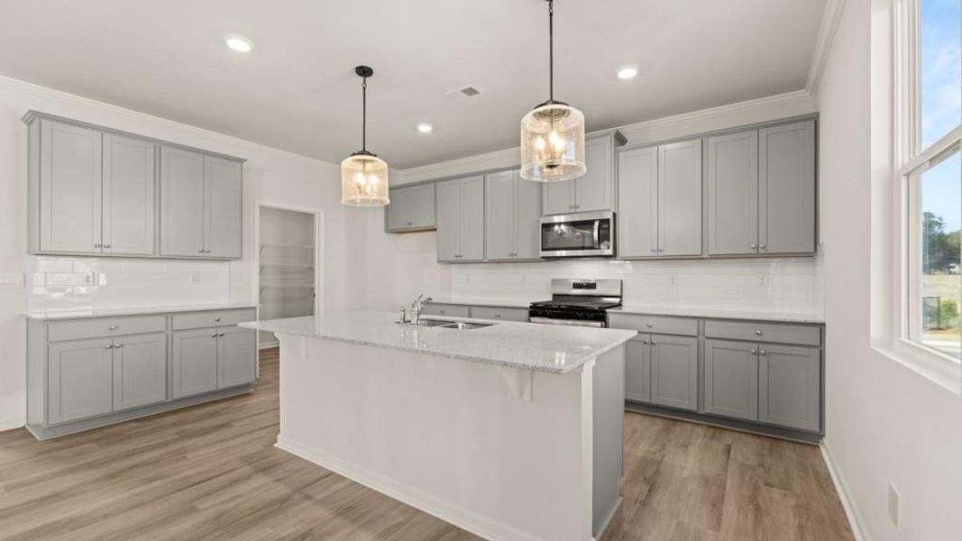 Furnished interior view inside a new home in Fairway 17 at Mirror Lake, Villa Rica (Image 6).