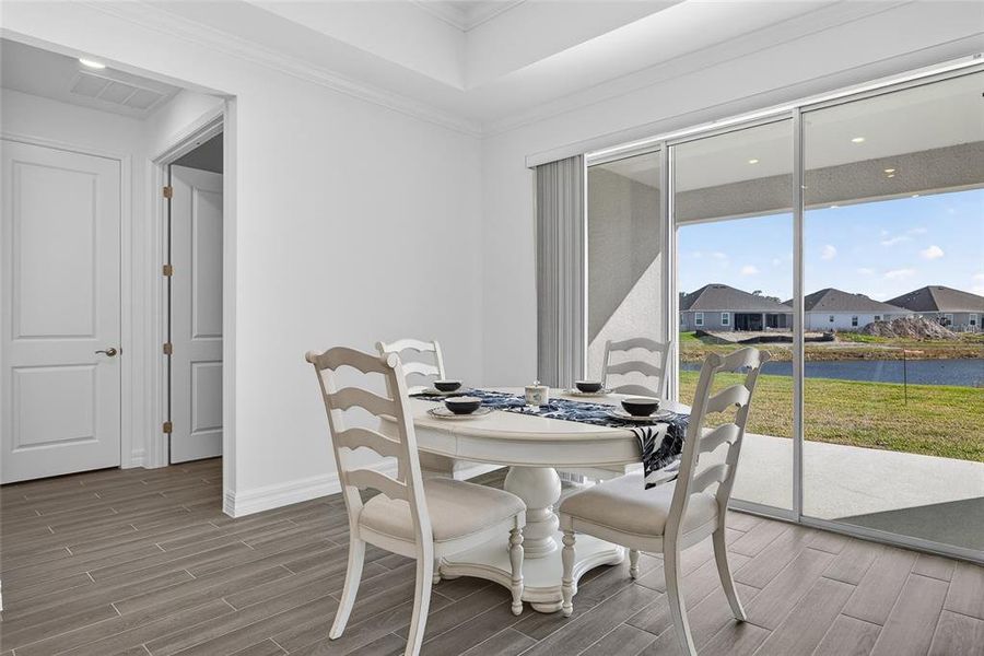 Furnished interior view inside a new home in Heritage Station, Punta Gorda (Image 16).