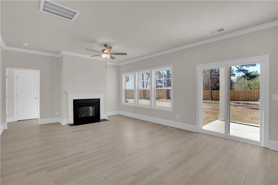 This bright living area features clean lines and a This bright living area features clean lines and a