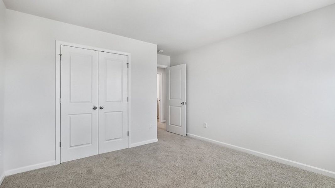 Representative unfurnished interior of a home built from the Edisto by D.R. Horton in Horton Park, Apex (Image 26).