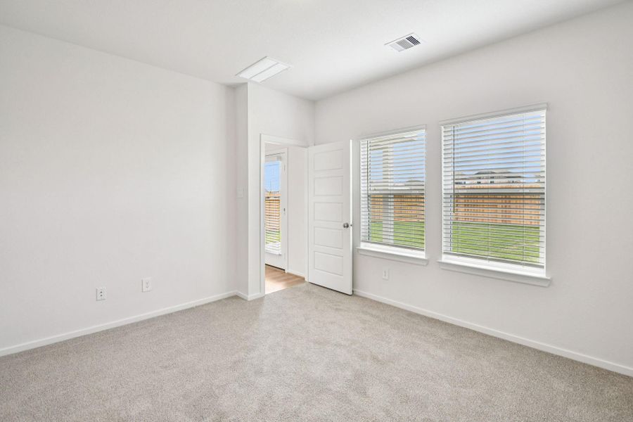 Spacious, unfurnished interior of a new home in Landing Meadows - Traditional Series, New Caney (Image 46).