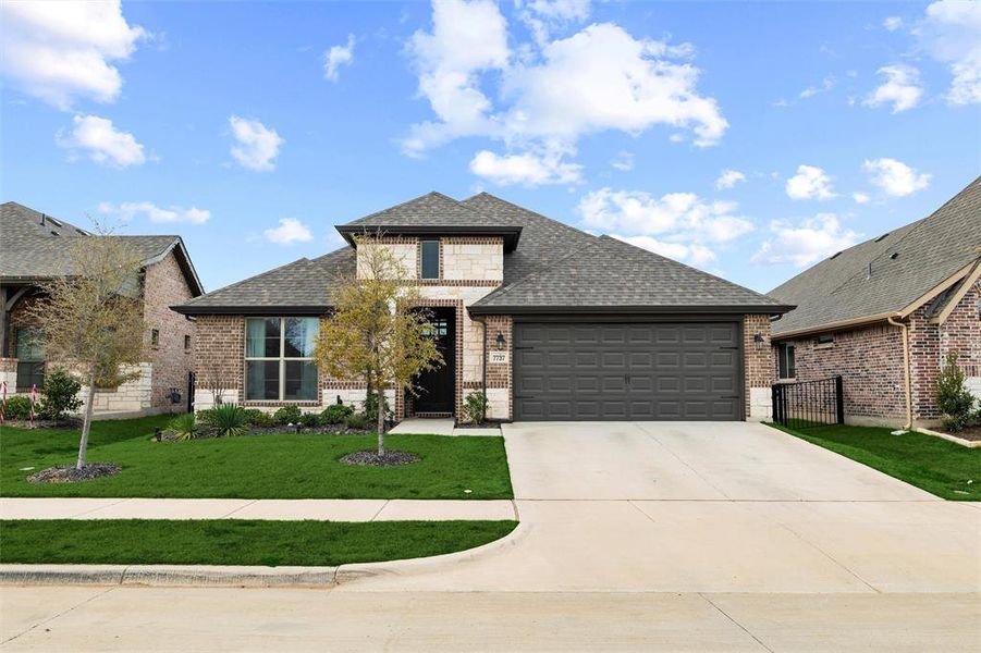 Front exterior of a new home in Silo Mills - Select Series, Joshua, TX, highlighting curb appeal (Image 21).