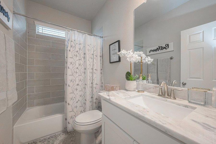 Furnished interior view inside a new home in Grand Magnolia, Magnolia (Image 9).
