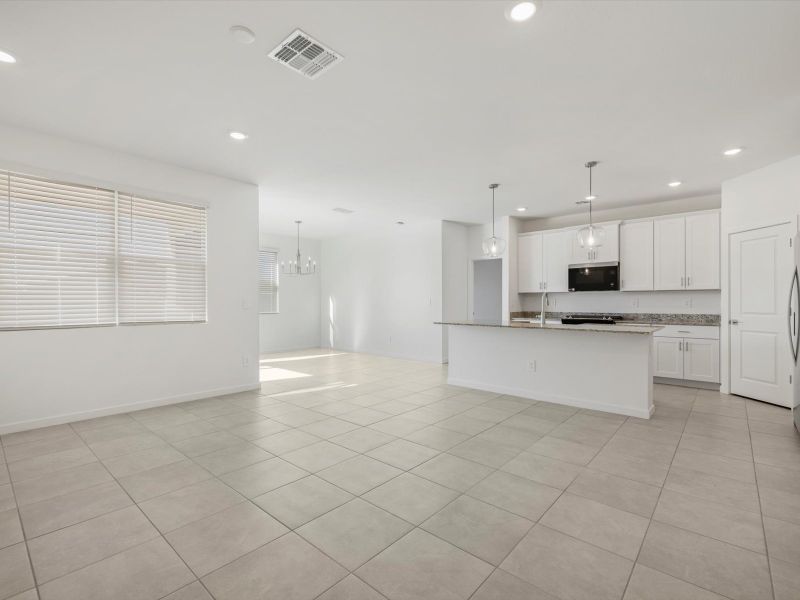 Spacious, unfurnished interior of a new home in Wildera, San Tan Valley (Image 13).