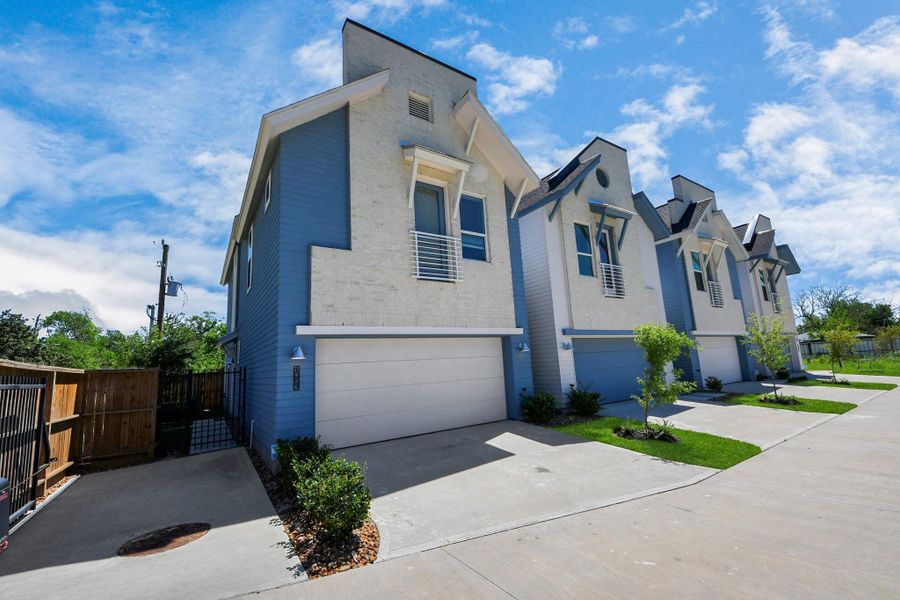 Front exterior of a new home in , Houston, TX, highlighting curb appeal (Image 32).