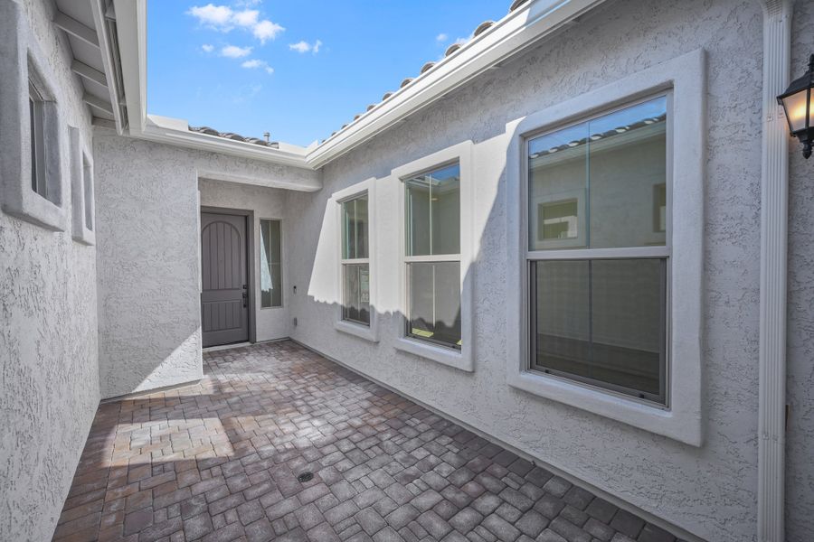 Exterior details and patio area of a home in Aloravita South, Peoria (Image 3).