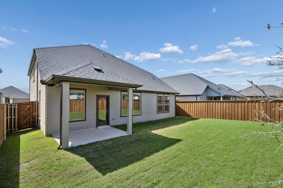 Covered Patio in the Winters home plan by Trophy Signature Homes – REPRESENTATIVE PHOTO
