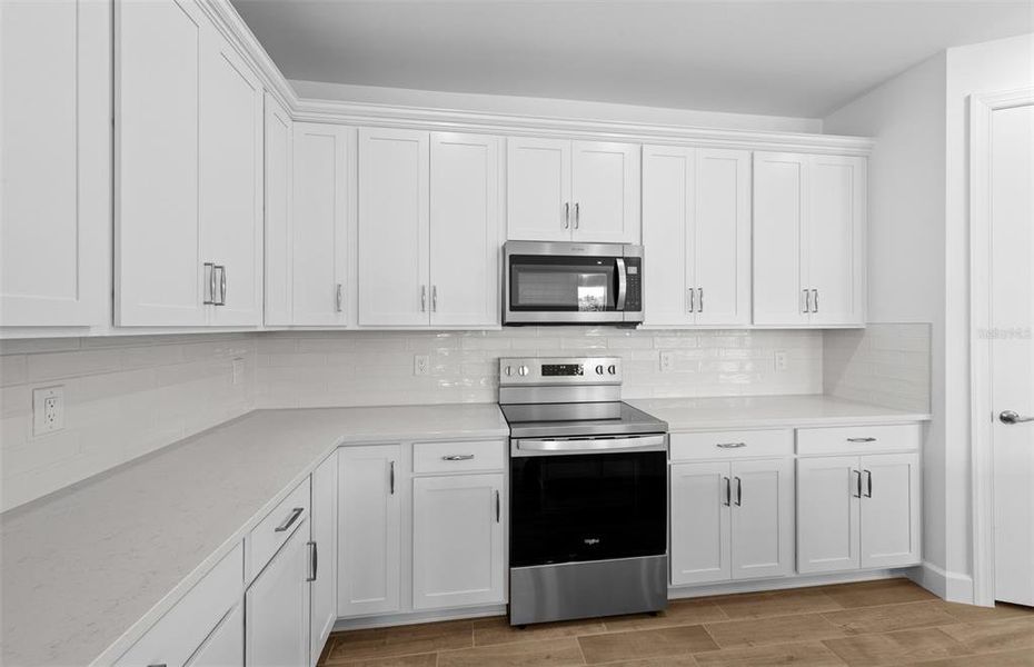 Furnished interior view inside a new home in Legacy Groves, Nokomis (Image 9).