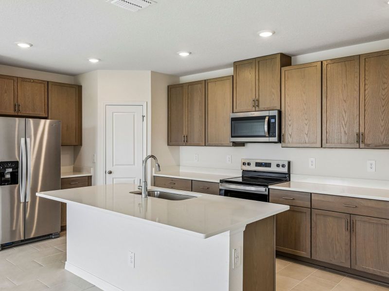 Furnished interior view inside a new home in Benton Hills - Classic Series, Brooksville (Image 5).