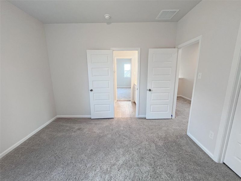 The Georgetown II- Bedroom 4. Home under construction. Sample floor plan photo used for illustrative purposes only. Upgrades, selections options, windows and colors may vary.