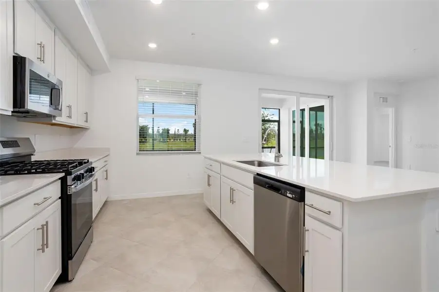 Furnished interior view inside a new home in Calusa Country Club, Lakewood Ranch (Image 5).