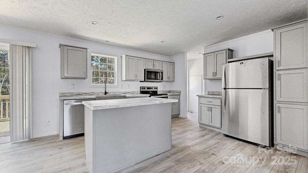 Furnished interior view inside a new home in , Statesville (Image 7).