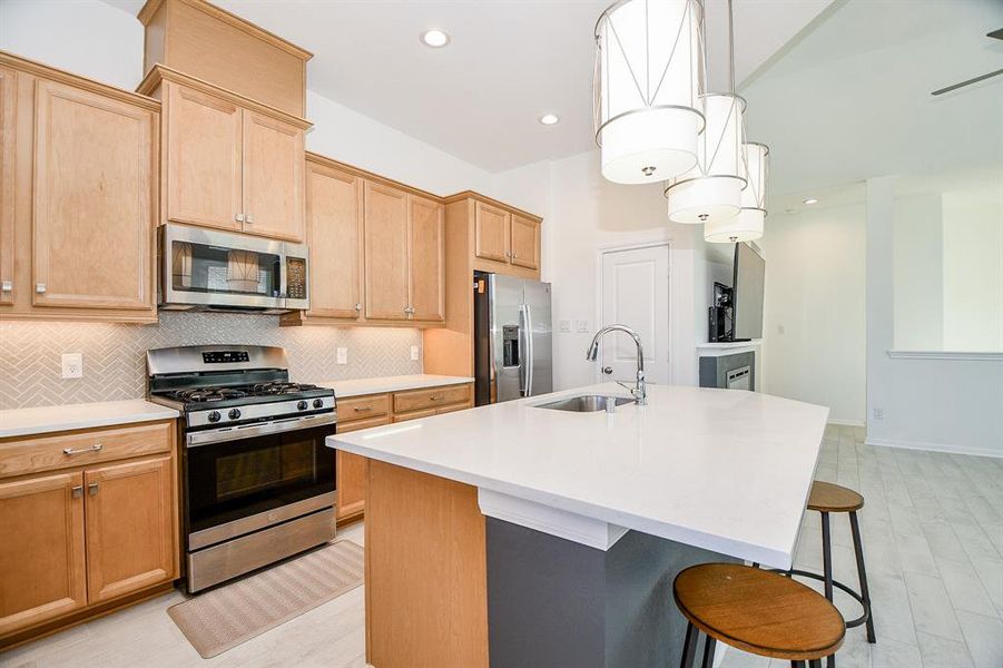 Ditch the takeout and enjoy cooking at home in this fully loaded kitchen. With ample countertop space, meal prep and cleanup are a breeze.