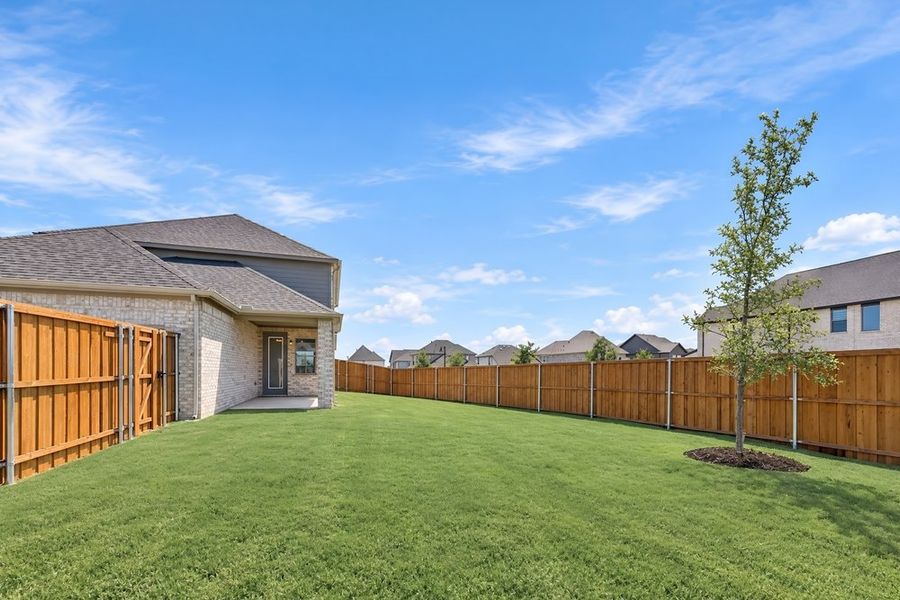 Exterior details and patio area of a home in Cross Creek Meadows, Celina (Image 19).