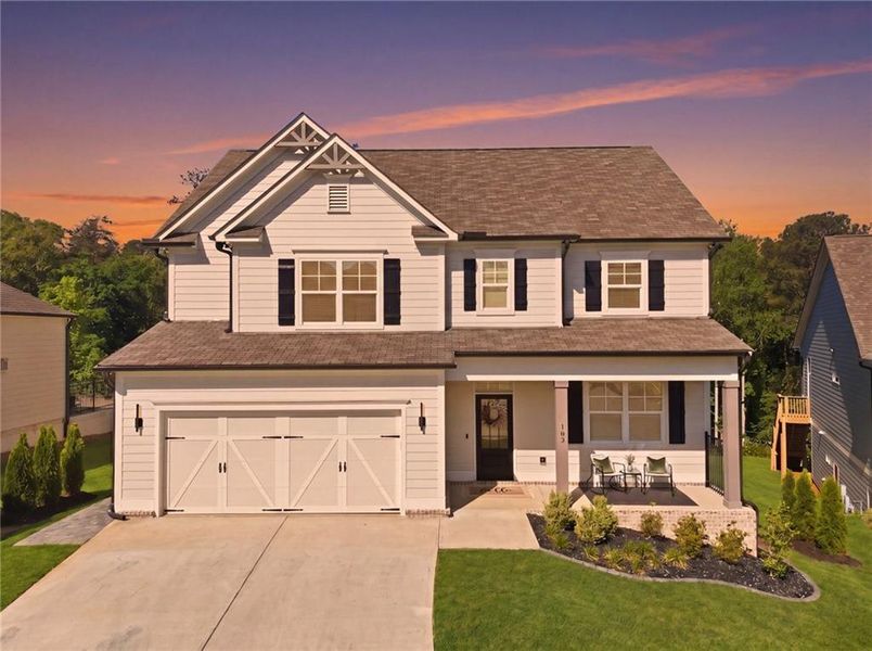 Front exterior of a new home in , Woodstock, GA, highlighting curb appeal (Image 26).