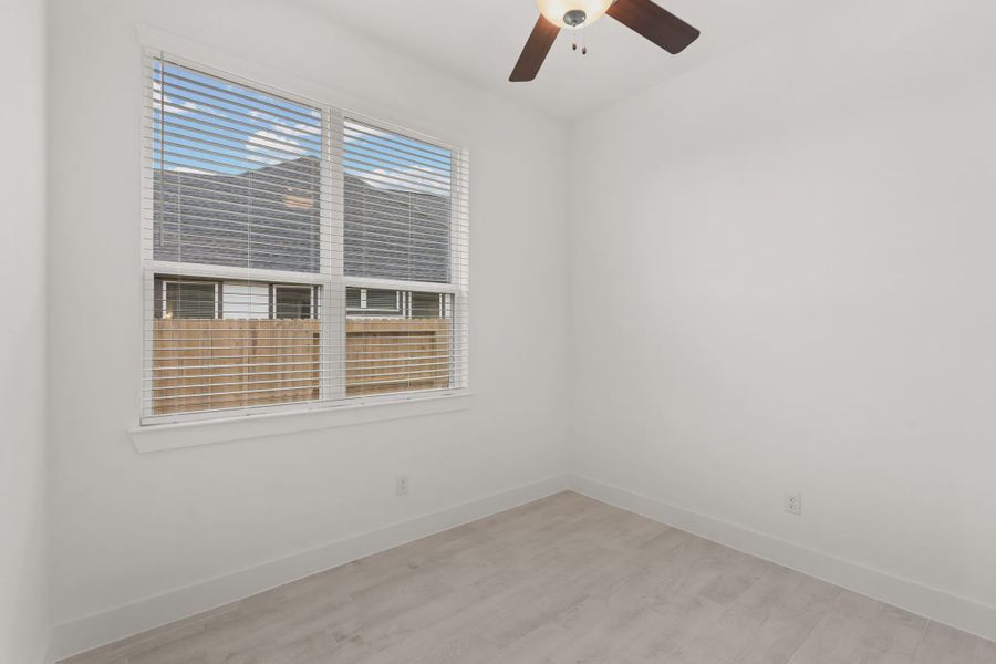 Representative unfurnished interior of a home built from the Mickelson by Chesmar Homes in Riceland Alley Loads, Mont Belvieu (Image 99).