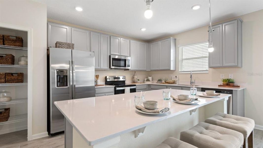 Furnished interior view inside a new home in Knightsbridge, Kissimmee (Image 2).