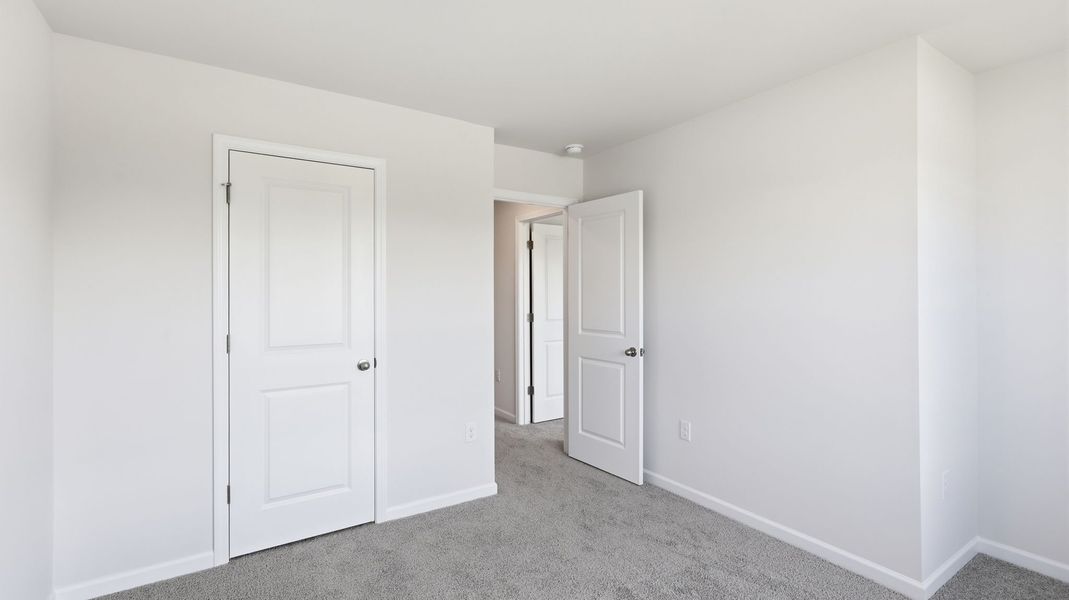 Spacious, unfurnished interior of a new home in Townes at Tap Root Farms, Fletcher (Image 22). Spacious, unfurnished interior of a new home in Townes at Tap Root Farms, Fletcher (Image 22).