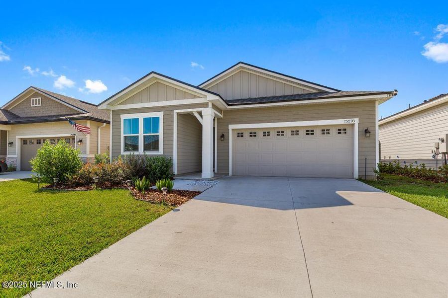 Front exterior of a new home in , Yulee, FL, highlighting curb appeal (Image 22). Front exterior of a new home in , Yulee, FL, highlighting curb appeal (Image 22).
