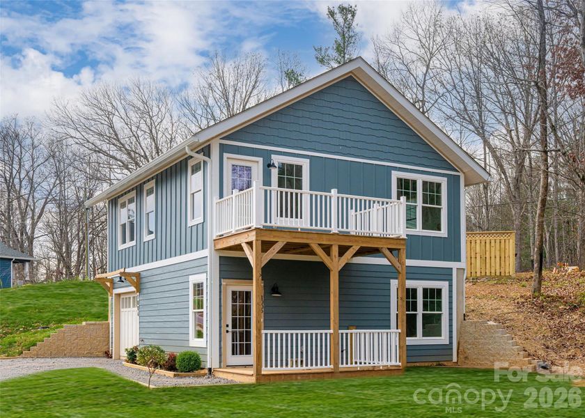 Exterior details and patio area of a home in , Black Mountain (Image 24).