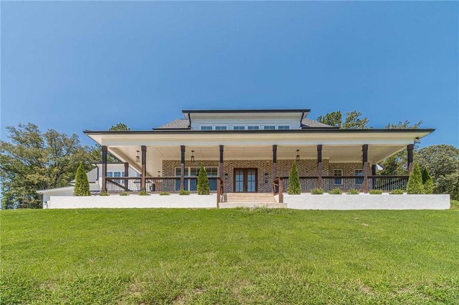 Front exterior of a new home in , Dacula, GA, highlighting curb appeal (Image 24).