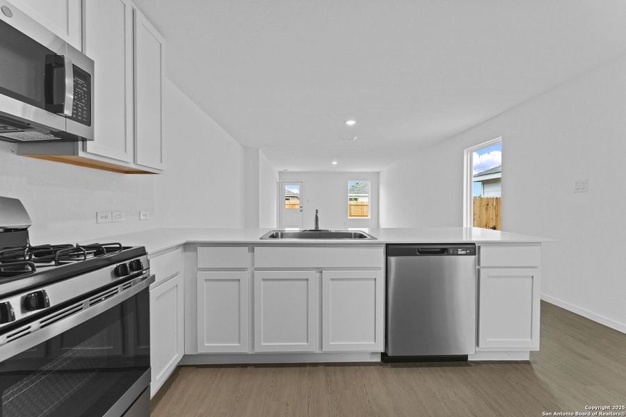 Furnished interior view inside a new home in Torian Village: Belmar Collection, San Antonio (Image 8).
