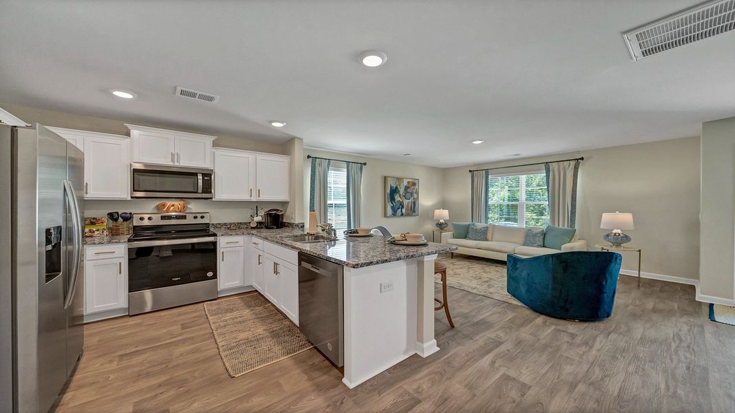 Representative furnished interior of a home built from the Pearson Th by D.R. Horton in Hunter's Branch Townhomes, Hopkins (Image 5).