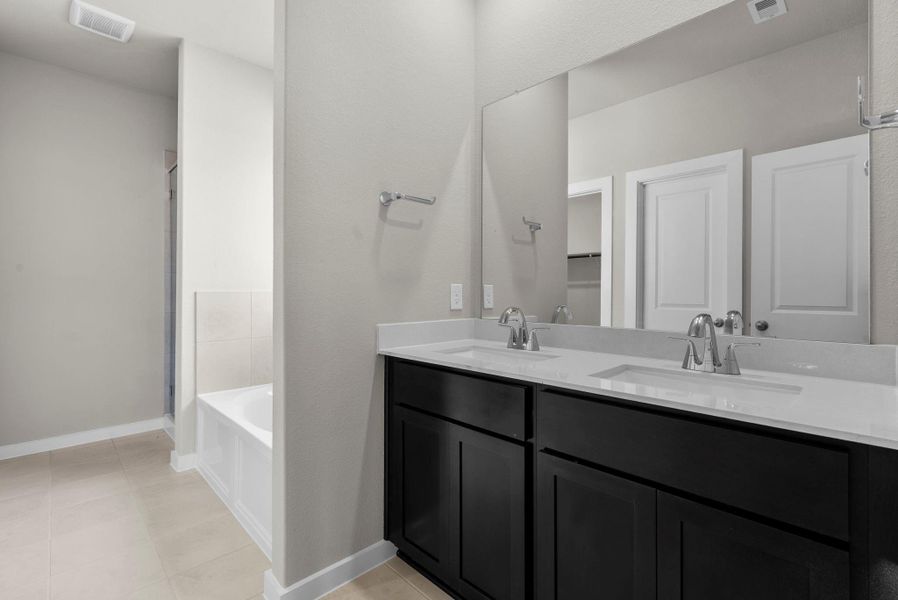 Furnished interior view inside a new home in Windrose Green 50', Angleton (Image 13).