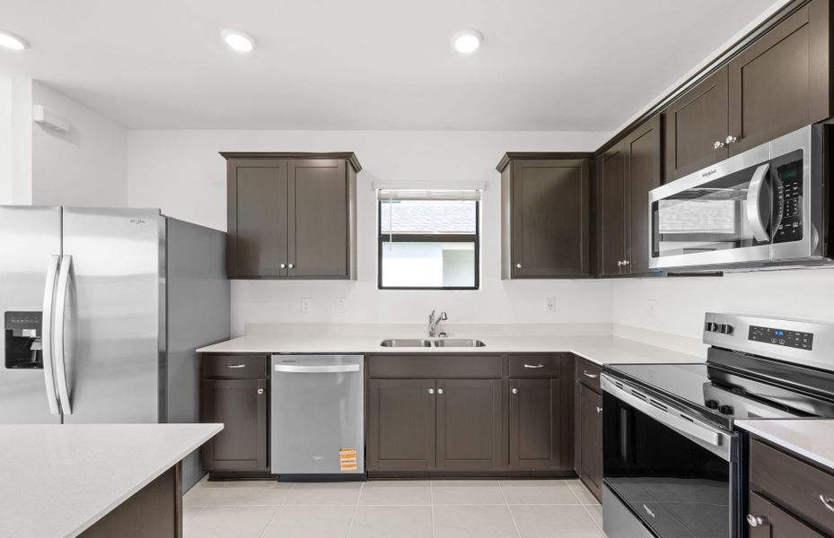 Furnished interior view inside a new home in Whispering Lakes, Lehigh Acres (Image 7).