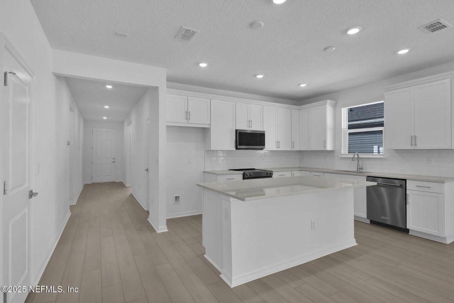 Furnished interior view inside a new home in Bradley Creek, Green Cove Springs (Image 11).