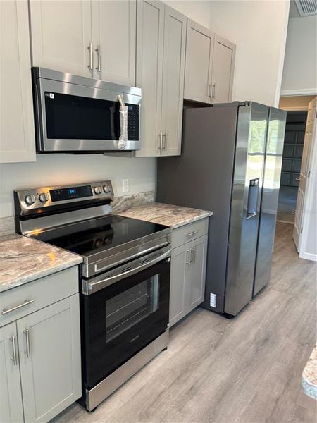 Furnished interior view inside a new home in , Citrus Springs (Image 8).