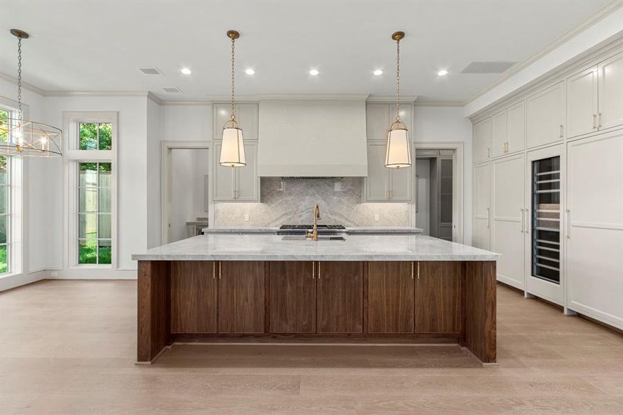 The Natural Stained island adds elegance and beauty to the kitchen.