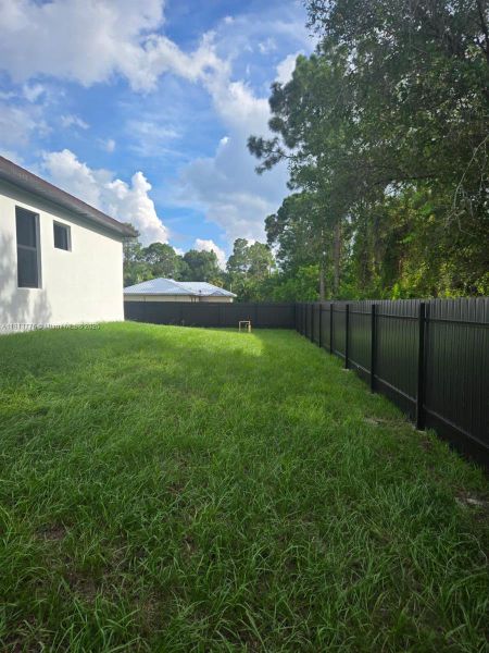 Exterior details and patio area of a home in , Lehigh Acres (Image 3).