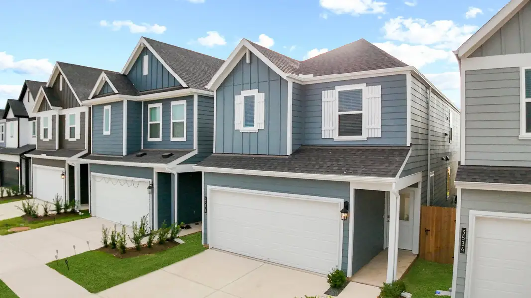 Front exterior of a new home in Villarosa at Tamarron, Katy, TX, highlighting curb appeal (Image 1). Front exterior of a new home in Villarosa at Tamarron, Katy, TX, highlighting curb appeal (Image 1).