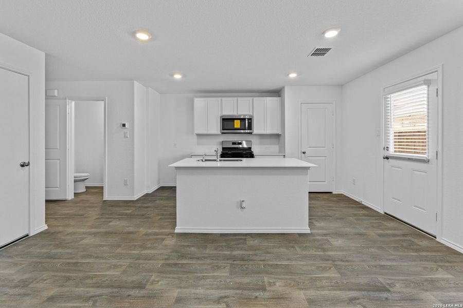 Furnished interior view inside a new home in Avenida, Converse (Image 5).