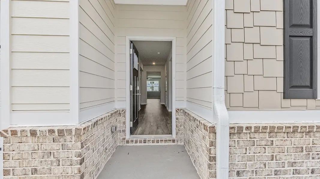 Exterior details and patio area of a home in Highland Hills, Graniteville (Image 2).