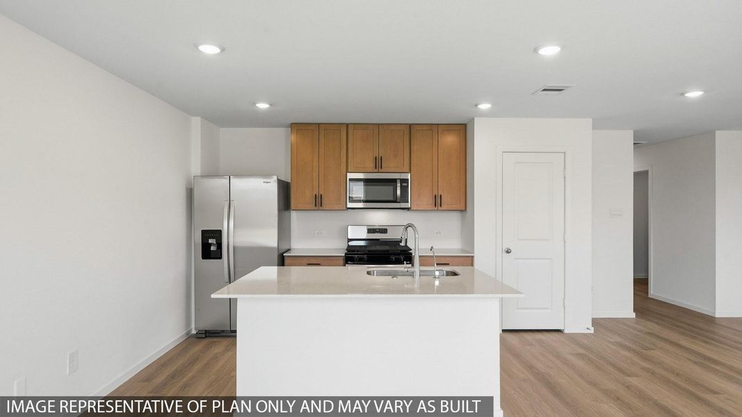 Furnished interior view inside a new home in Sunterra, Katy (Image 6).