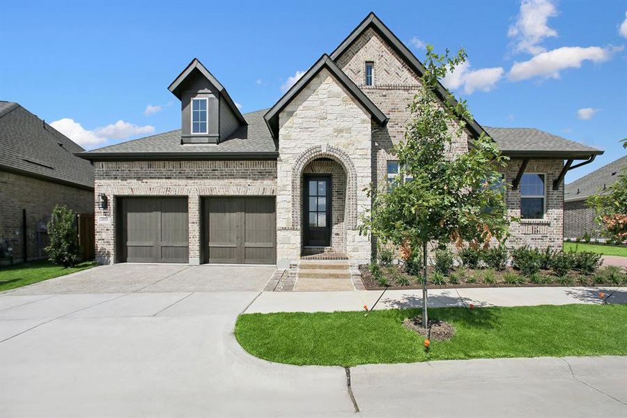 Front exterior of a new home in Elements at Viridian - Garden Series, Arlington, TX, highlighting curb appeal (Image 1).
