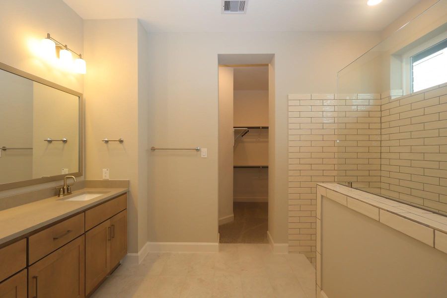 Furnished interior view inside a new home in COLTON - Reserve Collection, Todd Mission (Image 13).