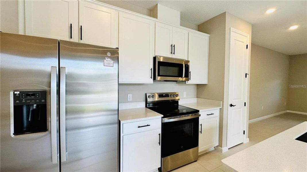 Furnished interior view inside a new home in , Kissimmee (Image 6). Furnished interior view inside a new home in , Kissimmee (Image 6).