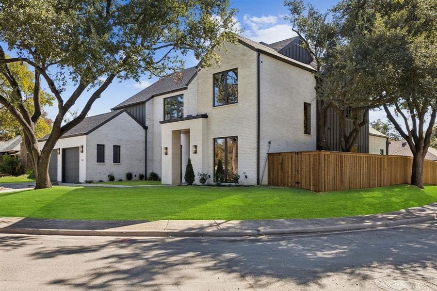 Front exterior of a new home in , Dallas, TX, highlighting curb appeal (Image 2).
