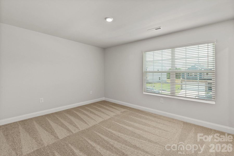 Spacious, unfurnished interior of a new home in Ascot Woods, Charlotte (Image 12).