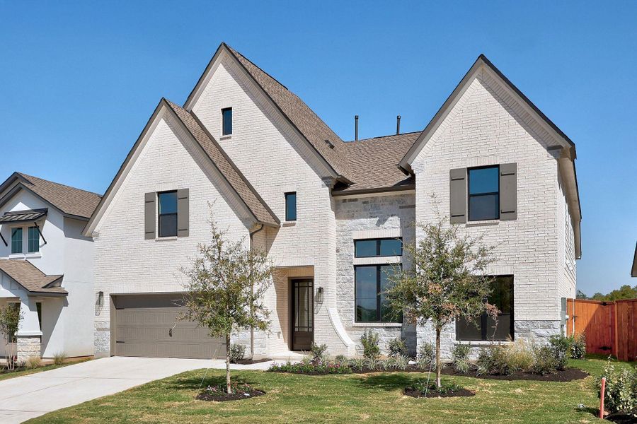 Front exterior of a new home in Parmer Ranch, Georgetown, TX, highlighting curb appeal (Image 23). Front exterior of a new home in Parmer Ranch, Georgetown, TX, highlighting curb appeal (Image 23).