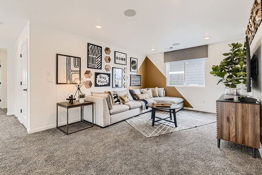 Representative furnished interior of a home built from the Ridgway by Taylor Morrison in The Fields at Looking Glass Town Collection, Parker (Image 35).