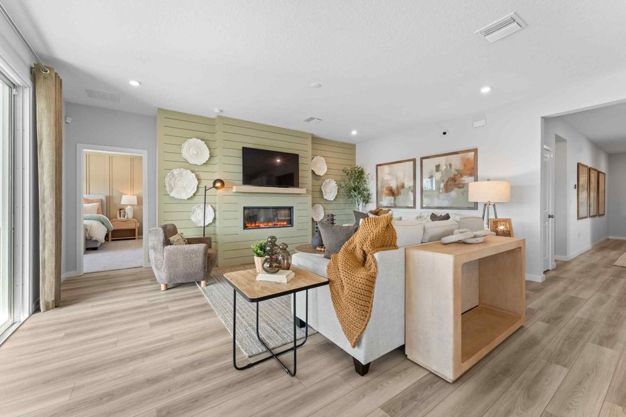 A living room with a fireplace.