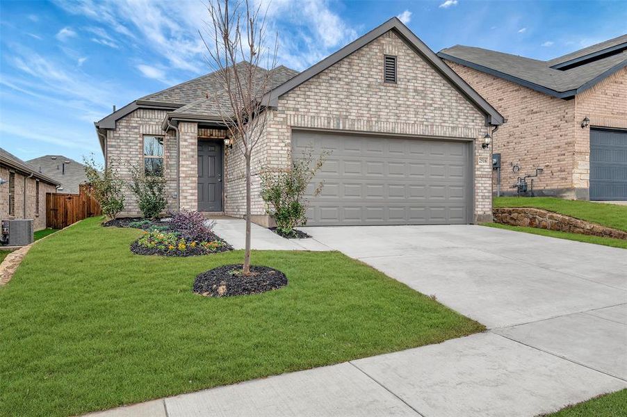 Front exterior of a new home in ValleyBrooke, Mesquite, TX, highlighting curb appeal (Image 22).