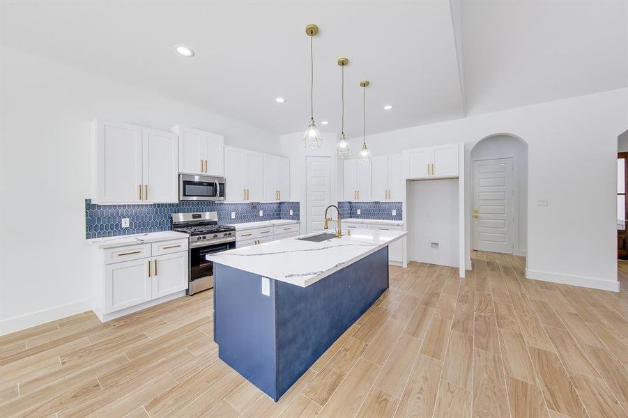 In this kitchen, convenience meets elegance. With a sleek built-in microwave and a dishwasher, the little things that make daily life easier are already here.