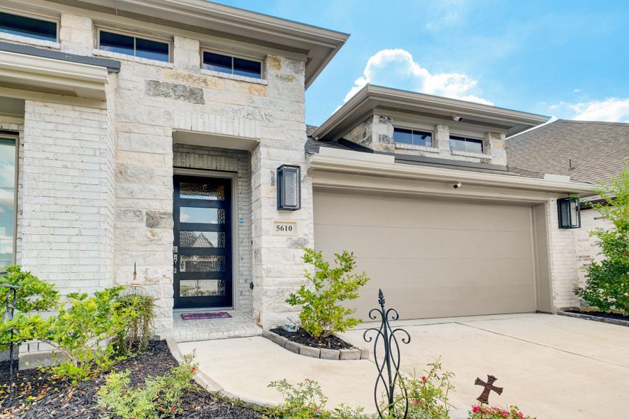 Exterior details and patio area of a home in Meridiana 55', Manvel (Image 2). Exterior details and patio area of a home in Meridiana 55', Manvel (Image 2).